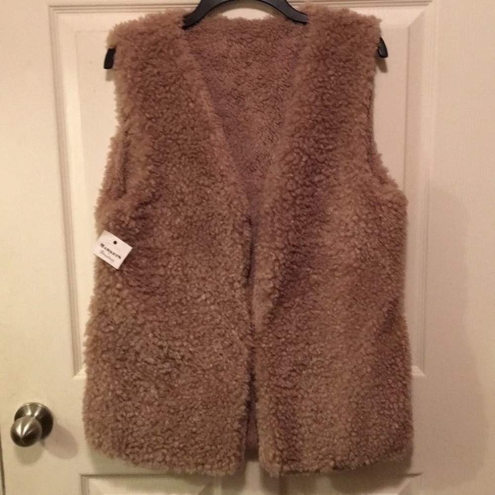 Faux lamb skin vest.
